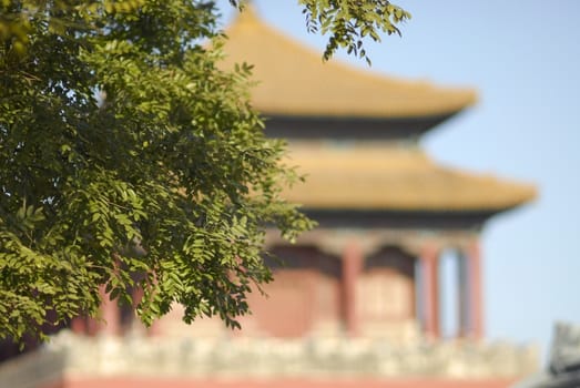 Oriental background with out of focus chinese pagoda. Forbidden City in Beijing.