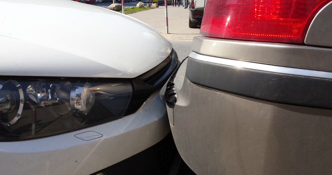 Small parking colission. Broken bumper. Real street photo.