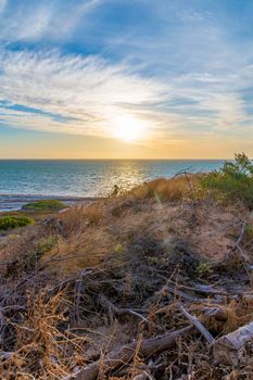 Coastal dune landscape in Shark Bay in Western Australia during beautiful sunset
