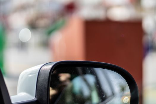 a blurry closeup shoot to car side mirror while moving. photo has taken from izmir/turkey.