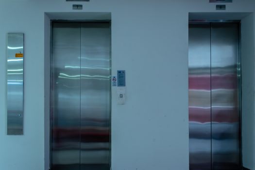 a isolated front view shoot of two elevators with metal doors. photo has taken from an university at izmir/turkey.