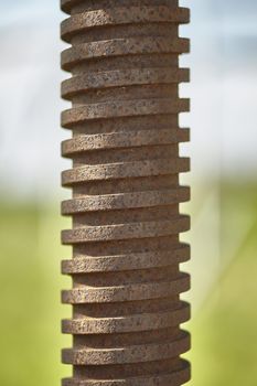 Detail of the square thread, now rusty of a mechanical press