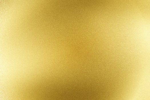 Abstract texture background, light shining on golden stainless sheet