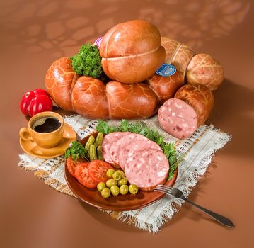 Still life with meat and different accessories on a studio background