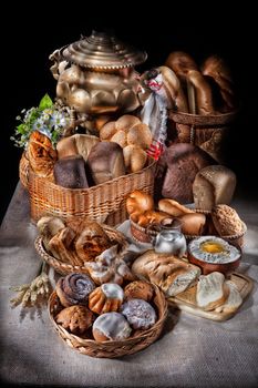 Different kinds of bread on a canvas studio background