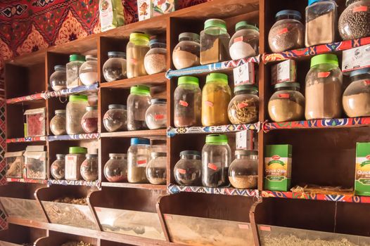 EGYPT, HURGHADA - 01 Avril 2019:Shelf of jars with various spices in a store of the city of Hurghada in Egypt