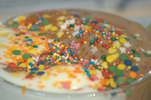 Ice cream in a bowl with decorative dressing. Still life.