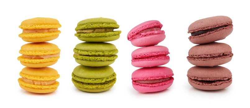 french colorful macarons isolated on white background