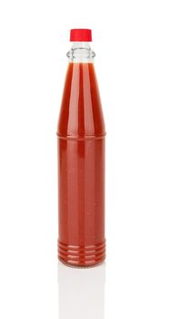 Bottle of spicy red hot sauce isolated on white background