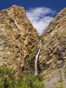 Waterfall in the mountains. Altai Republic, Russia