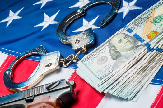 Money laundering concept photo crime and punishment, dollars and american flag