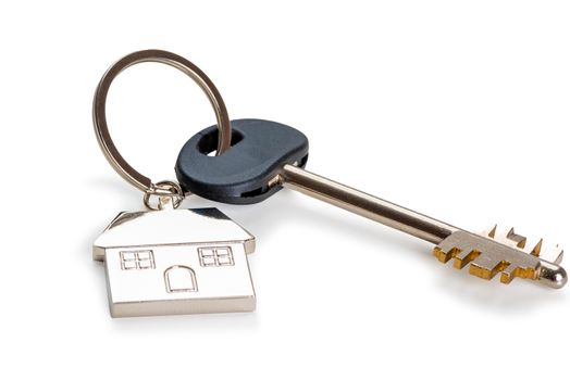 key with a key fob in the form of a house on a white background is isolated
