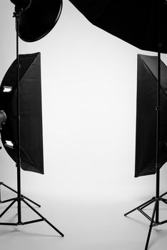 Flashes on a white background in the studio, there are no people in the frame