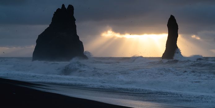 Rock spire of Reynisdrangur, coast of Reynisfjara close to Vik, Iceland, Europe