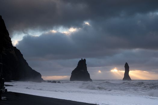 Rock spire of Reynisdrangur, coast of Reynisfjara close to Vik, Iceland, Europe