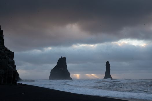 Rock spire of Reynisdrangur, coast of Reynisfjara close to Vik, Iceland, Europe