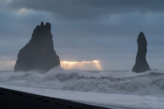 Rock spire of Reynisdrangur, coast of Reynisfjara close to Vik, Iceland, Europe