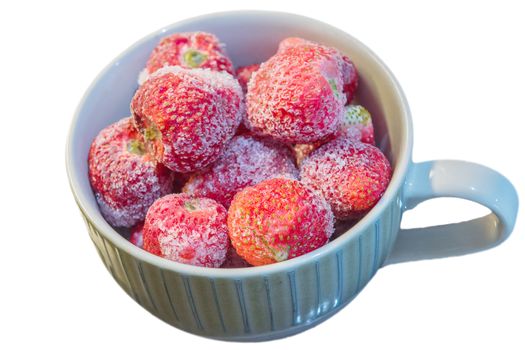 Frozen strawberries, with chunks of ice, for making smoothies, isolated against white background