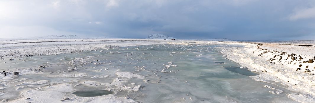 Panoramic view on a frozen river, winter in Iceland, Europe