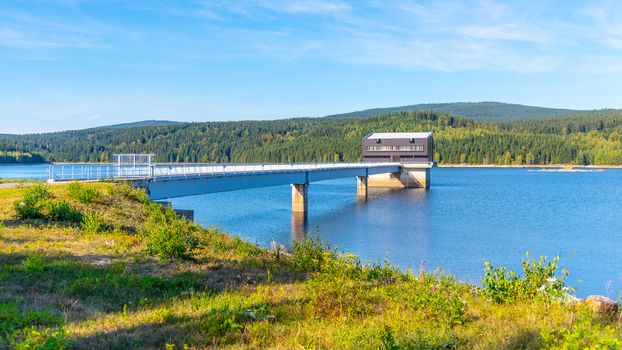 Mountain water reservoir Josefuv Dul, aka Josefodolska Dam, Jizera Mountains, Czech Republic. Sunny summer day.