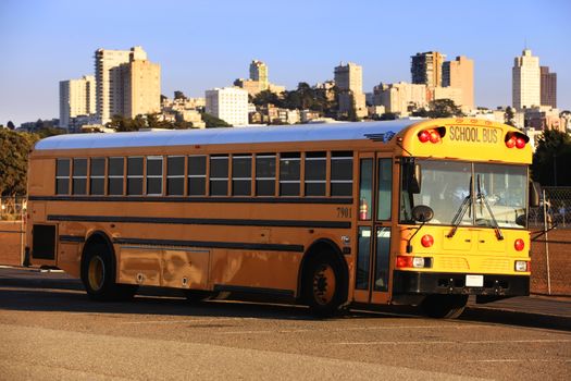 Traditional yellow school bus in San Francisco, America 