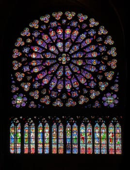 PARIS - OCTOBER 25, 2016: South rose stained glass window of Notre Dame cathedral
