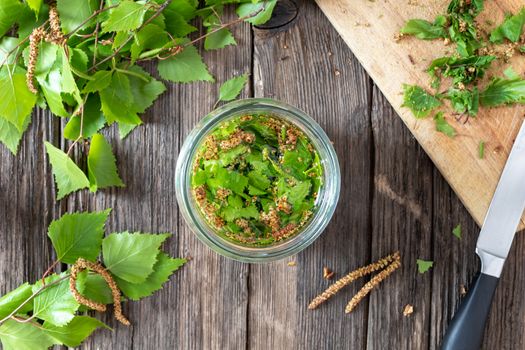 Preparation of tincture from young birch leaves and catkins, top view