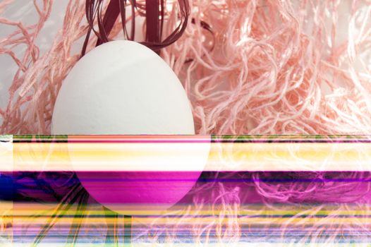 Shooting Easter, one egg on a pink background - damaged file. Abstract texture background noise Glitch camera VHS pixel error. For use in the modern fashionable promotional or projects.