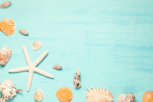 Blue sea background with copy space and seashell border, summer holiday and vacation concept.