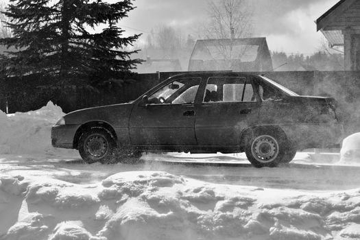 blizzard, parked car, image of rural life