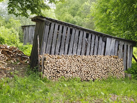firewood sheds, image shows detail of village life