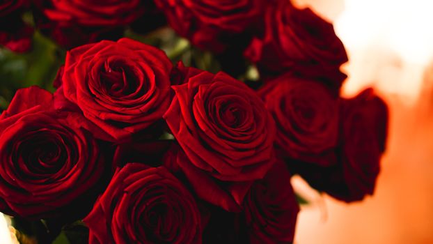 Red roses bouquet with free space for text. Selective focus