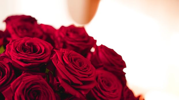 Red roses bouquet with free space for text. Selective focus