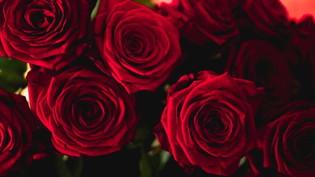 Red roses bouquet with free space for text. Selective focus