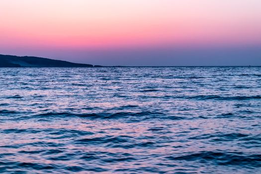 a wide landscape shoot of sea at sunset with awesome colors. photo has taken at izmir/turkey.