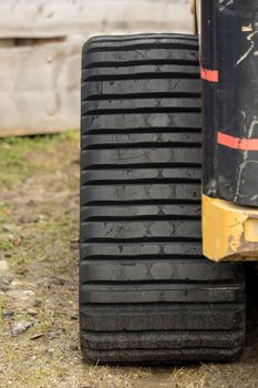 A big caterpillar wheel on a construction vehicle