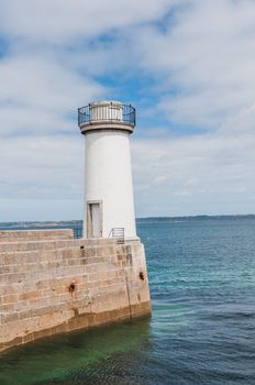 Port of Camaret-sur-mer with its boats, its lighthouse, in Finistère in Brittany, France