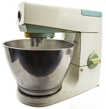old 70s vintage tabletop kitchen mixer against white background