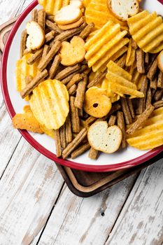 Crispy potato chips in bowl.Homemade potato chips