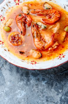 Tom Yam kung Spicy Thai soup with shrimp.Soup with fish and seafood