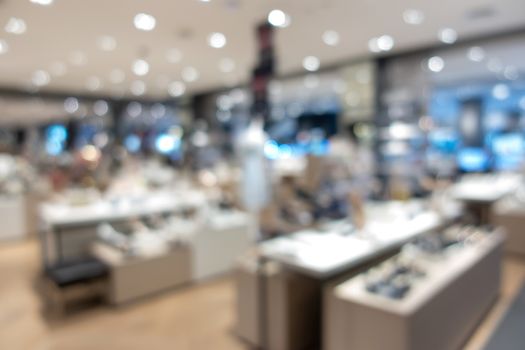 defocus shot of shoes on shelf in the store 