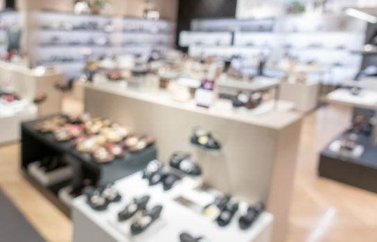 defocus shot of shoes on shelf in the store 