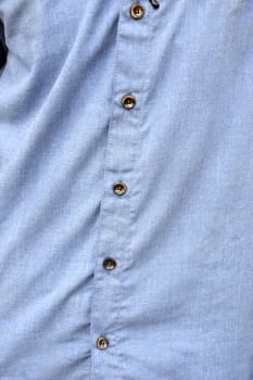 buttoned blue dress shirt