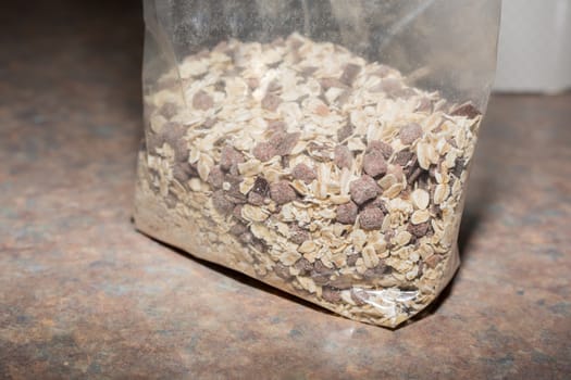 A bag of cereal on the worktop