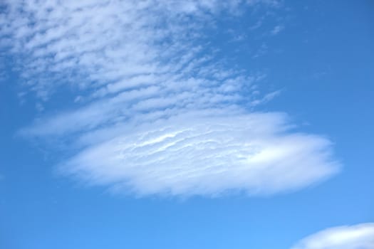 Clouds on the blue sky, texture or background