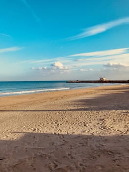 Scenic View Of Sea Against Clear Blue Sky and Sunlight