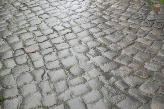 Floor of paving stones wet from the rain