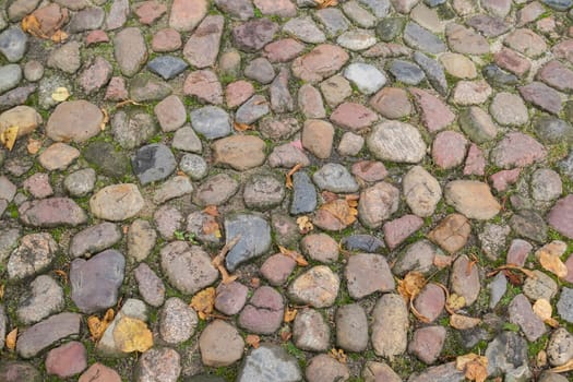 Floor of paving stones wet from the rain