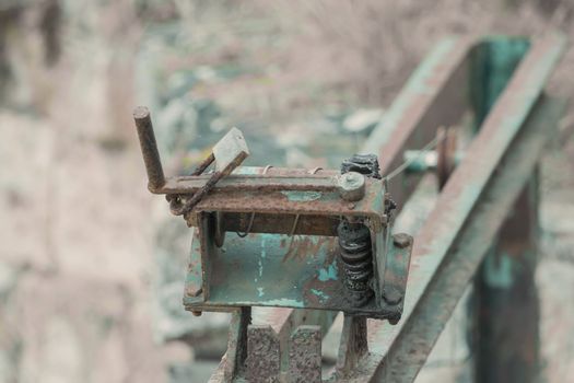 Old, rusty winch with soft bokeh