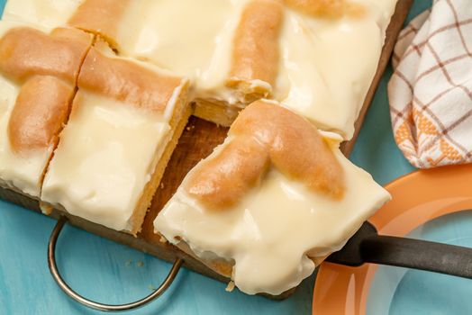 Sliced Apple Pie with Sour Cream on Wooden Cutting Board - photo, image.